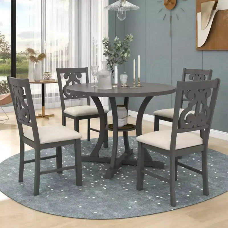Ensemble de salle à manger rond 5 pièces en bois avec pieds de forme spéciale et dossier de chaise évidé au design – Sanzelize Design