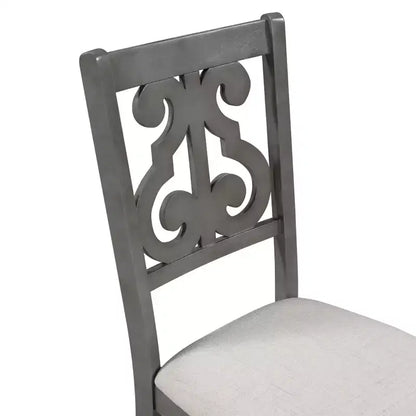 Ensemble de salle à manger rond 5 pièces en bois avec pieds de forme spéciale et dossier de chaise évidé au design – Sanzelize Design